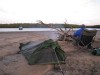 camp set up on an exposed sand bar