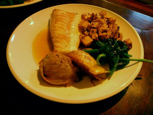 Oven-baked Dhufish with citrus sauce, baked celeriac, braised fennel and steamed spinach. 