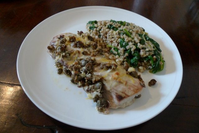 Dolly baked with parmesan, capers and lemon rind, served with buckwheat and spinach.